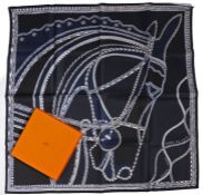 Hermes silk 'Robe du Soir' scarf, horse head design on dark blue ground, in original box, 90cm x