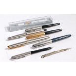 Four various Parker fountain pens, together with a Parker protractable pencil, a Waterman fountain