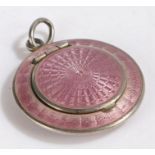 Continental silver and lilac enamel miniature powder compact, of circular form with hanging loop,