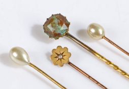 9 carat gold and pearl stick pin, three other stick pins, the largest 7.5cm long (4)