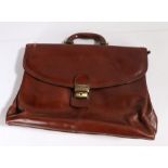 A Gianni Conti tan leather attache case, stamped, fully lined, a/f