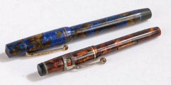 An Ingersoll marbled fountain pen, with 14ct gold nib; together with a De La Rue 'Dainty' marbled