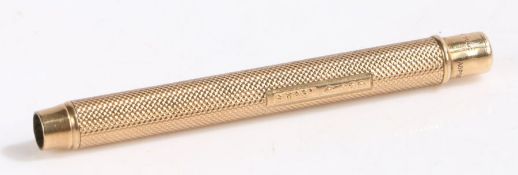 Sampson Mordan & Co. 9 carat gold propelling pencil, the cylindrical engine turned body with push-