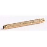 Sampson Mordan & Co. 9 carat gold propelling pencil, the cylindrical engine turned body with push-