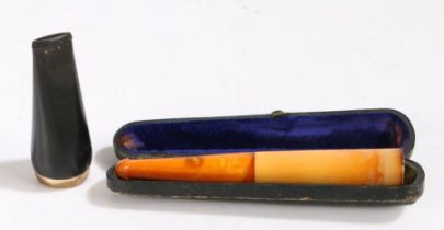 Cigar holder with amber effect mouth piece, housed in a blue suede lined leather case, 11.5cm