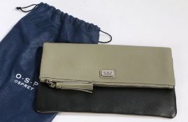 Osprey O.S.P. leather clutch bag, the zipped top opening to reveal a purple silk lined interior with