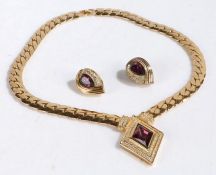 A Christian Dior suite of costume jewellery, comprising a curblink necklace with diamond shaped