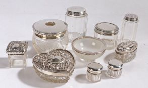 Collection of ten silver lidded and rimmed glass dressing table pots and bowls, to include a