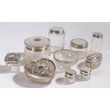 Collection of ten silver lidded and rimmed glass dressing table pots and bowls, to include a