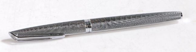 Waterman C/F fountain pen, with white metal engine turned body and cap opening to reveal an 18 carat