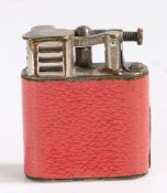 Dunhill "Sports" pocket lighter, the striker with hinged cover above a red leather body, patent