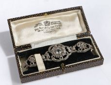 A silver, maracsite and paste set bracelet, of foliate scroll link form, in box from 'The Alexr.