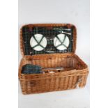 Fortnum and Mason wicker picnic set, with Wedgwood 'Night and Day' cups, saucers and side plates,