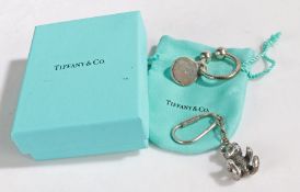 Tiffany & Co. sterling silver keyring, with hanging disc engraved "2001 TIFFANY & CO. 925", with