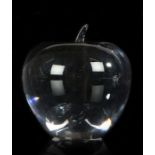 A Tiffany & Co. clear glass paperweight in the form of an apple, etched mark to base, 8cm in