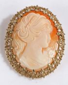 A cameo brooch in 9 carat yellow gold foliate scroll mount