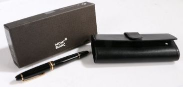 Montblanc Meisterstuck Traveller fountain pen, the polished black body with gilt mounts, 14 carat