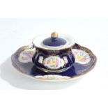 A 19th century plate together with a inkwell, baring Meissen marks, the dark blue ground with floral