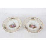 Pair of Meissen porcelain cabinet plates, the first painted with a courting couple, the second