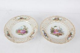 Pair of Meissen porcelain cabinet plates, the first painted with a courting couple, the second