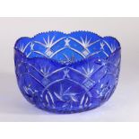 Substantial Bohemian blue and clear glass bowl, the overlaid blue and clear glass bowl with star and