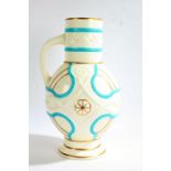 Large 19th century water jug in the Celtic taste by Powell Bishop & Stonier, with a white bulbous