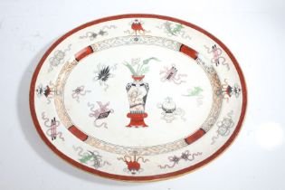 Large 19th century Minton oval meat plate, decorated with a chinoiserie design in red and white,