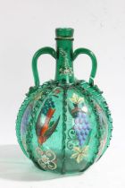 An early 20th century green glass wine bottle, with polychrome hand painted designs depicting grapes