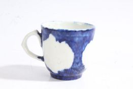 Rare West Pans coffee cup, circa 1768, the exterior with blue decoration surrounding three vacant