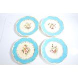 Collection of four 19th century hand painted porcelain plates, all decorated with a light blue