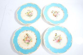 Collection of four 19th century hand painted porcelain plates, all decorated with a light blue