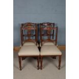 Set of four 20th century carved dining chairs, with a floral carved cresting rail together with