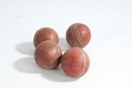 Collection of four cricket balls, red leather and strung, (4)