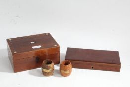 Two miniature teak barrels, made from H.M.S. Iron Duke, together with a Victorian rosewood box and a