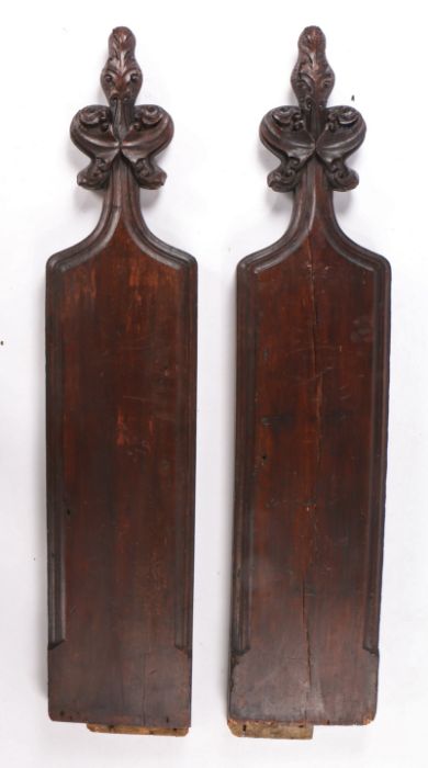 Pair 19th Century carved pine pew ends, the poppy head finials above rectangular pew sides, 129cm