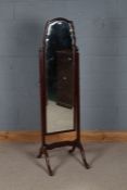 20th century mahogany cheval mirror, with a wavy border above a beveled glass plate, 160cm high