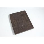 Chinese tea brick, moulded with a pagoda to the center, five stars above and Chinese characters