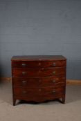 Victorian mahogany bow fronted chest of four long graduating drawers, the top decorated with boxwood