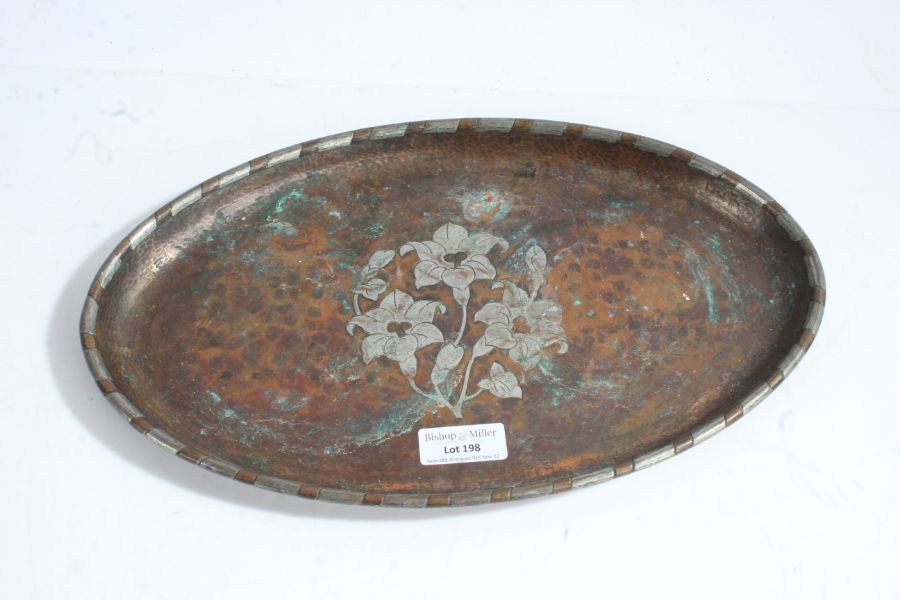 Harold Holmes Arts and Crafts copper tray, of oval form, with silvered flowers to the centre, marked