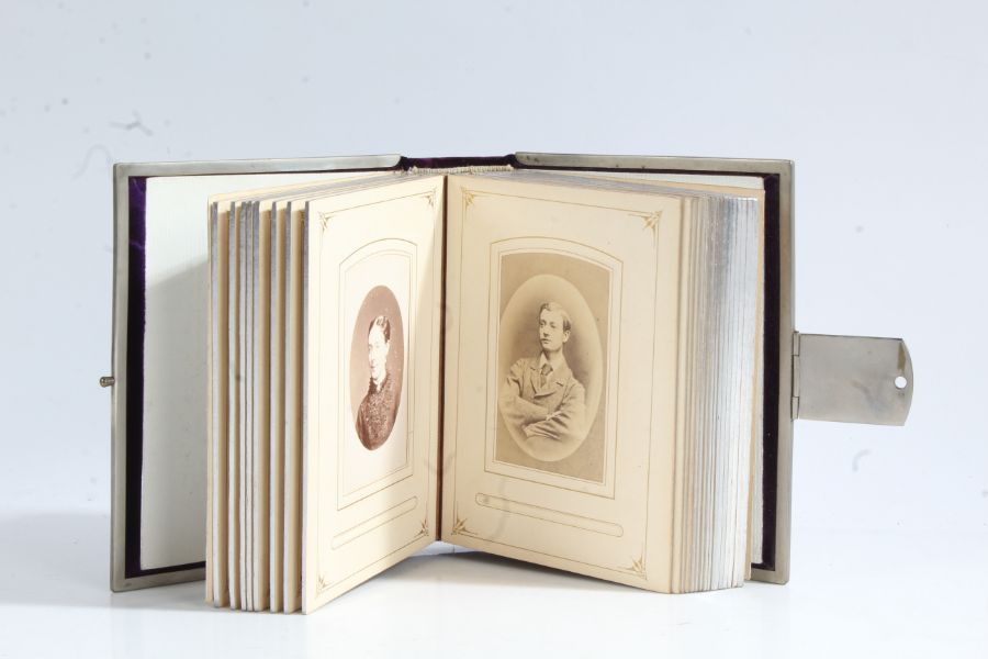 Carte De Visite containing mostly Victorian scenes, housed within purple velvet case, 16cm by 14cm