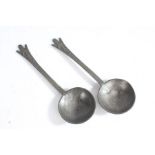 Pair of 15th century style pewter spoons, having figural decorated stems, touch marks to bowl (2)
