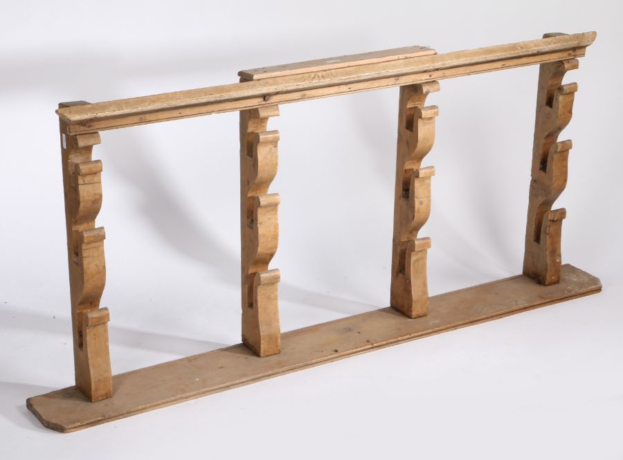 19th Century pine spit rack, the four arched supports with a plinth top and shelf base, 164cm