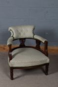 Victorian mahogany nursing chair, the upholster back and seat above a pierced supports raised on