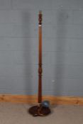 20th century mahogany standard lamp, with a turned column on a circular base, 159cm high