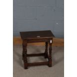 17th century style oak joint stool, the rectangular top above turned legs and plain stretchers, 46cm