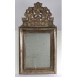 19th Century and later Italian silvered mirror, surmounted by a floral pediment above the mirror