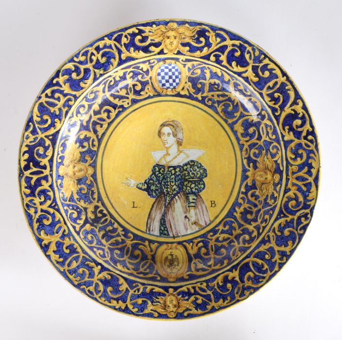 Italian majolica charger, decorated with a central lady and the initials LB with a blue and yellow