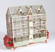 Early 20th Century French birdcage, the painted cage formed of three floors, 65cm wide, 55cm high