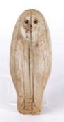 Primitive carved decoy owl, with bead eyes and a shaped body, 29cm high