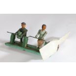 Swedish whirly gig, circa 1940, with two figures on a green painted frame, 42cm long